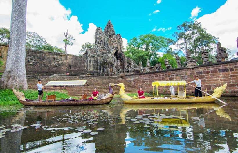 Angkor Bike tour & Gondola Sunset Boat w/ Drinks & Snack - Rice fields and family parcels beyond the main road