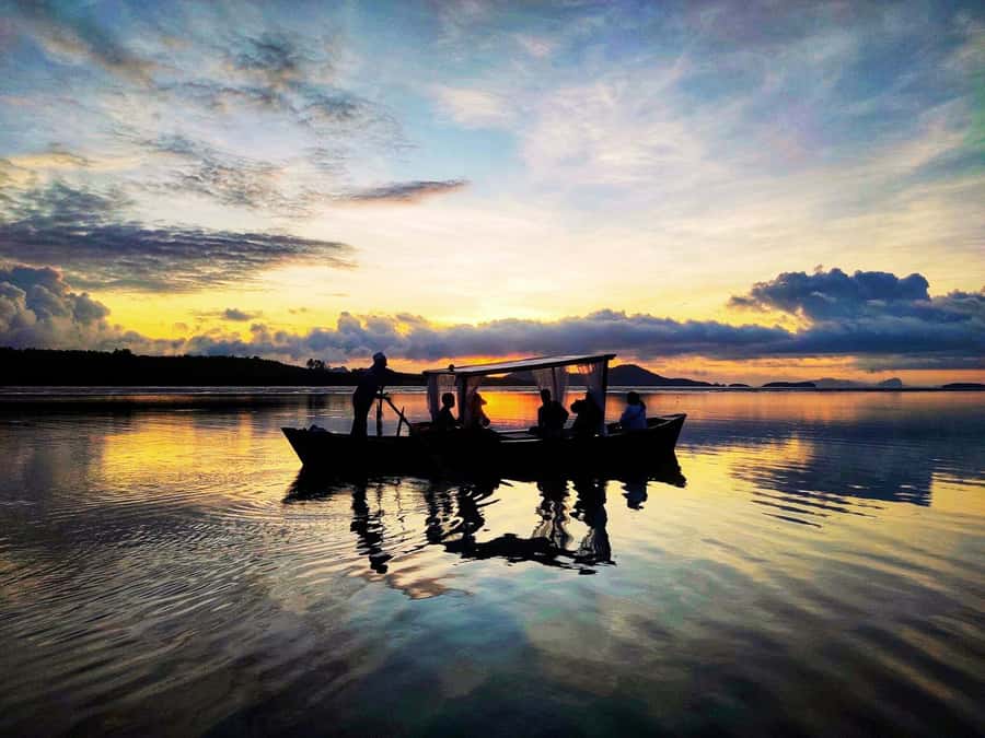 Ko Lanta: Sunrise Gondola Boat Ride with Breakfast - The Guides and Community Connection