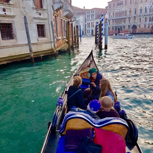 Venice: 30 min Gondola Ride on the Grand Canal with Guide - Palazzo Grassi and the Grand Canal palaces