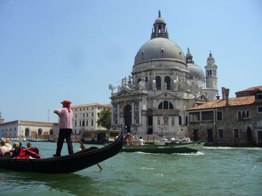Venice: 30 min Gondola Ride on the Grand Canal with Guide - Turning into smaller Venetian canals