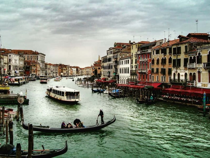 Venice: Gondola Ride under the Bridge of Sighs and Premium Audio Guide - Boarding a shared Venetian gondola