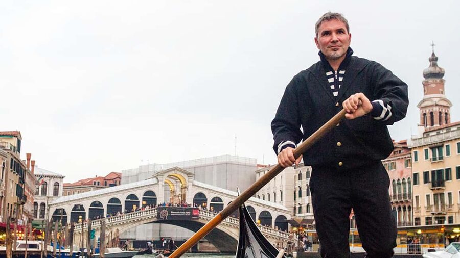 Venice: St. Mark's Basilica Guided Tour & Gondola Ride - Acqua Alta bookshop and its canal view