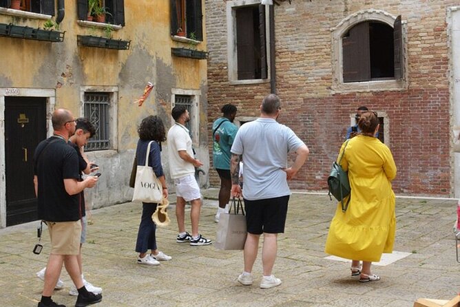 Venice Walking Tour with Gondola Ride Experience - The opera house and a notable church